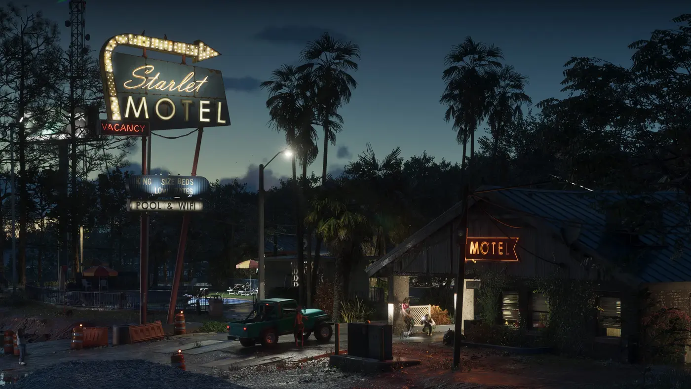 Enseigne néon du Starlet Motel dans GTA VI à la tombée de la nuit, avec les panneaux VACANCY, KING SIZE BEDS LOW RATES et POOL & WIFI au-dessus d'un motel entouré de palmiers